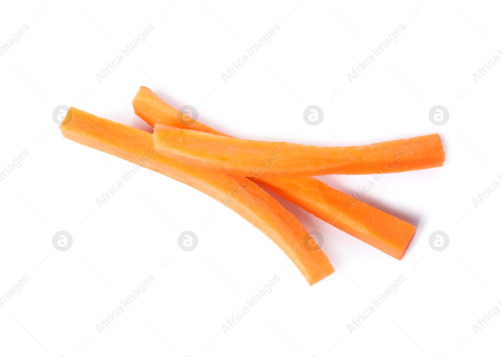 Photo of Fresh ripe carrot sticks isolated on white, above view