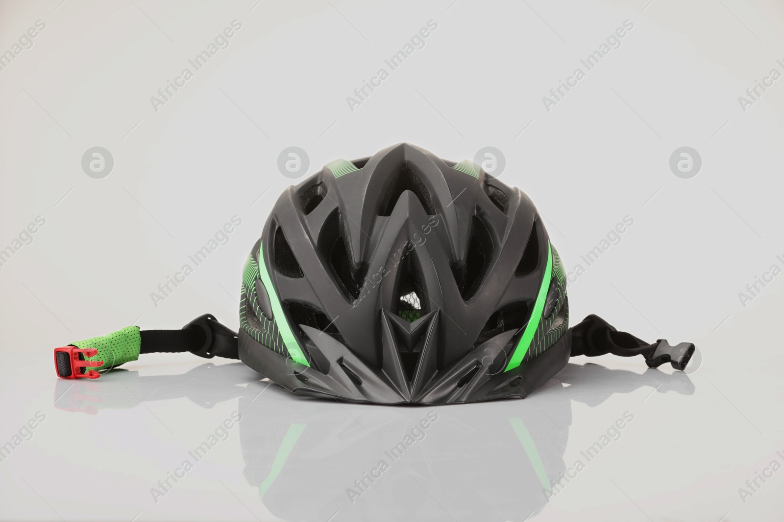 Photo of One new protective helmet on white background