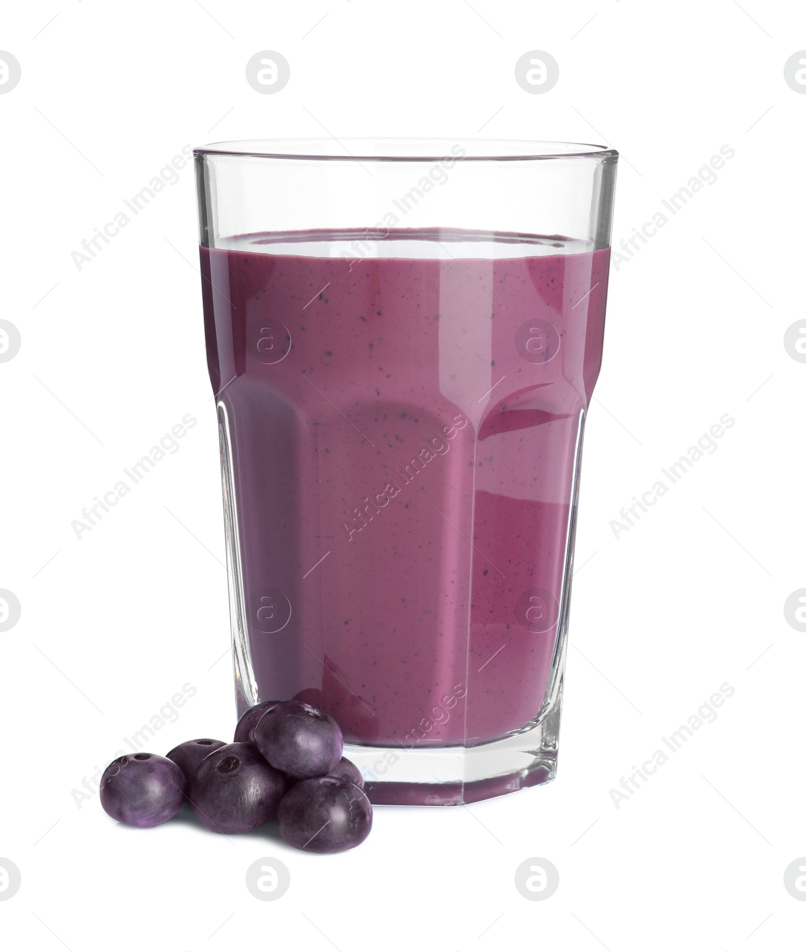 Photo of Tasty acai juice in glass and berries isolated on white