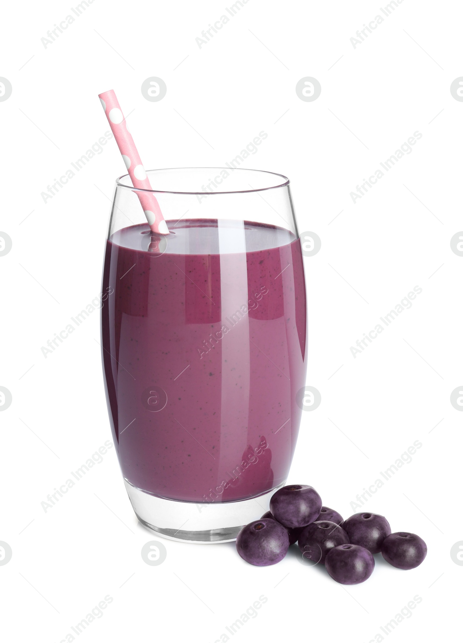 Photo of Tasty acai juice in glass and berries isolated on white