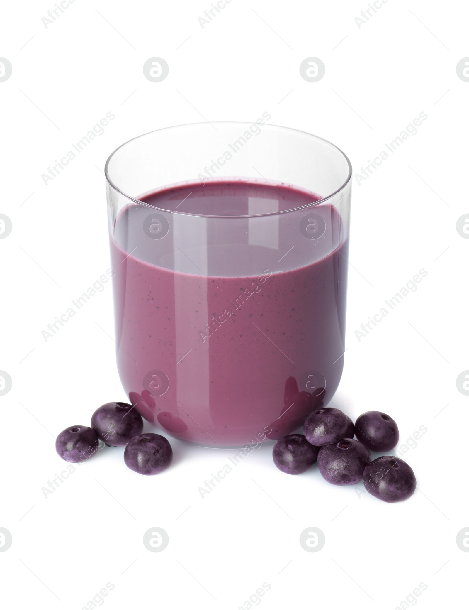 Photo of Tasty acai juice in glass and berries isolated on white