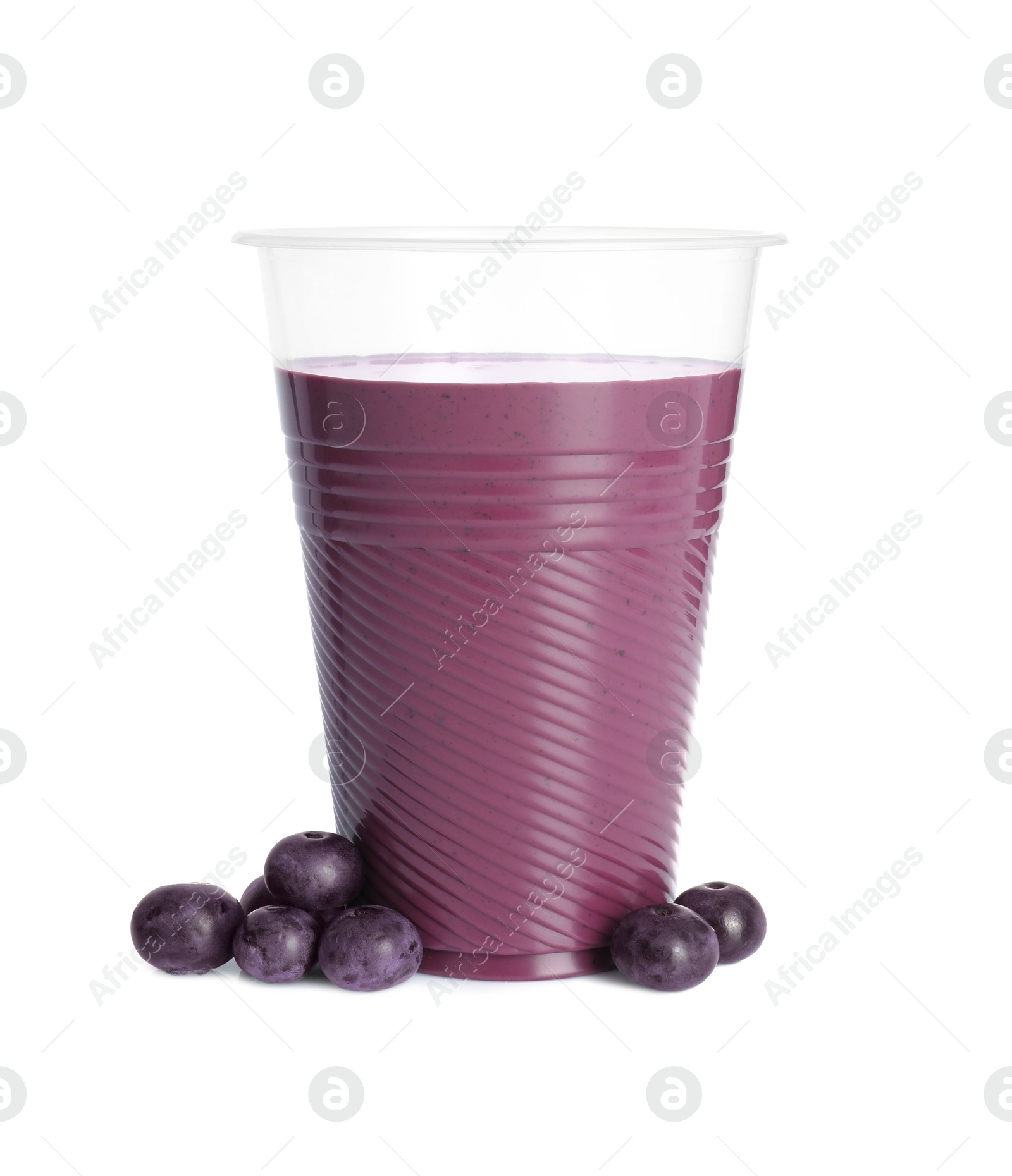 Photo of Tasty acai juice and berries isolated on white