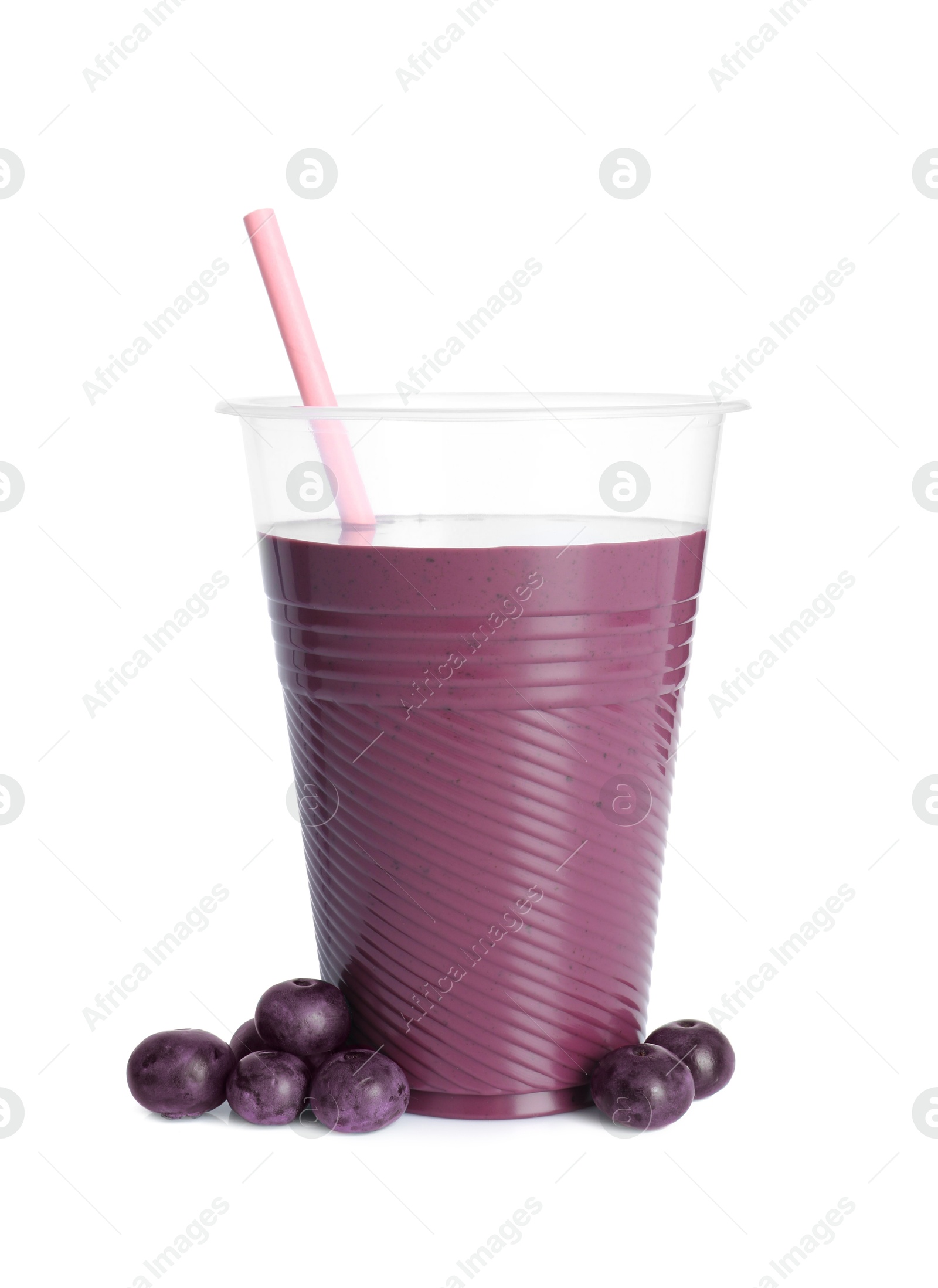 Photo of Tasty acai juice and berries isolated on white