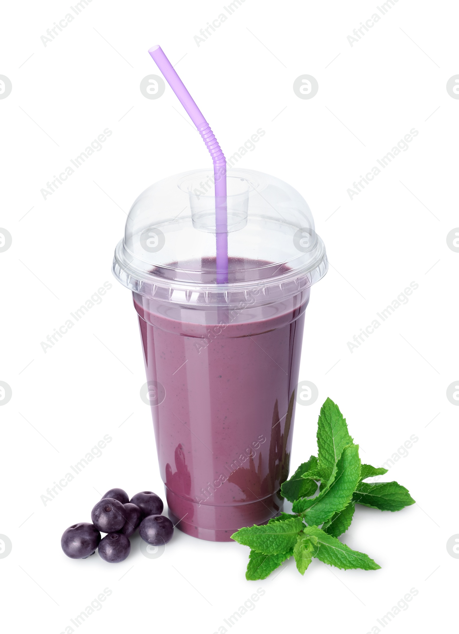 Photo of Tasty acai juice, mint and berries isolated on white