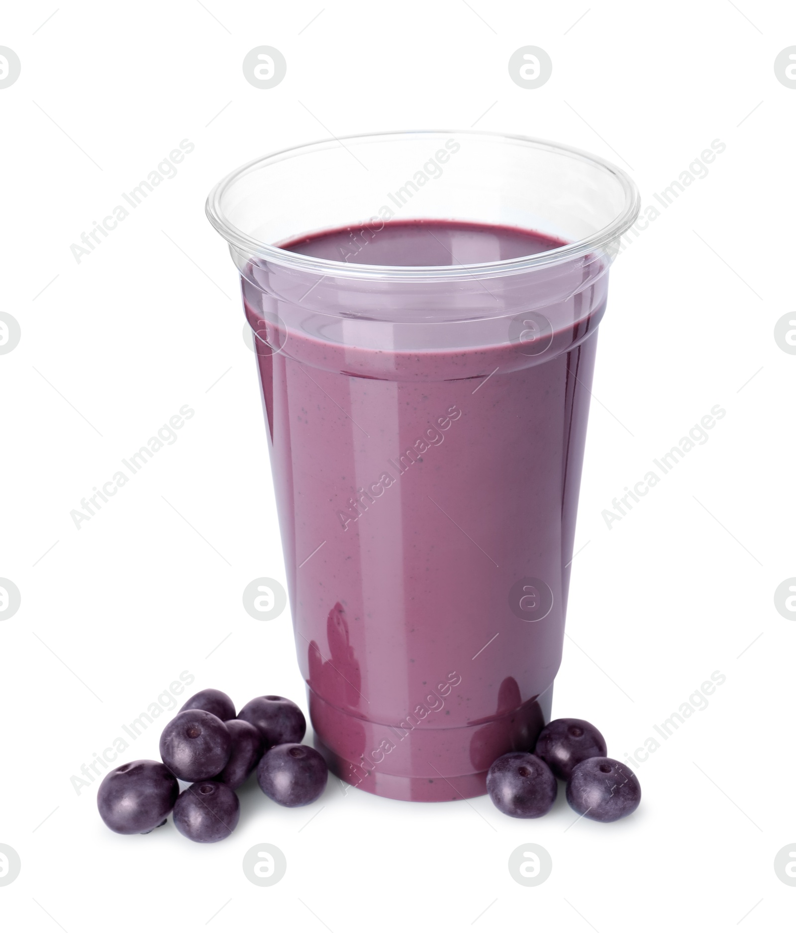 Photo of Tasty acai juice and berries isolated on white