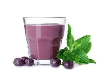 Tasty acai juice in glass, mint and berries isolated on white