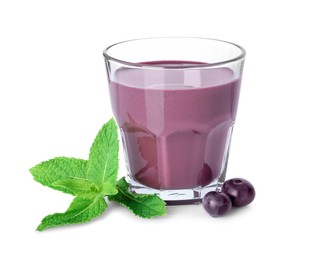 Tasty acai juice in glass, mint and berries isolated on white