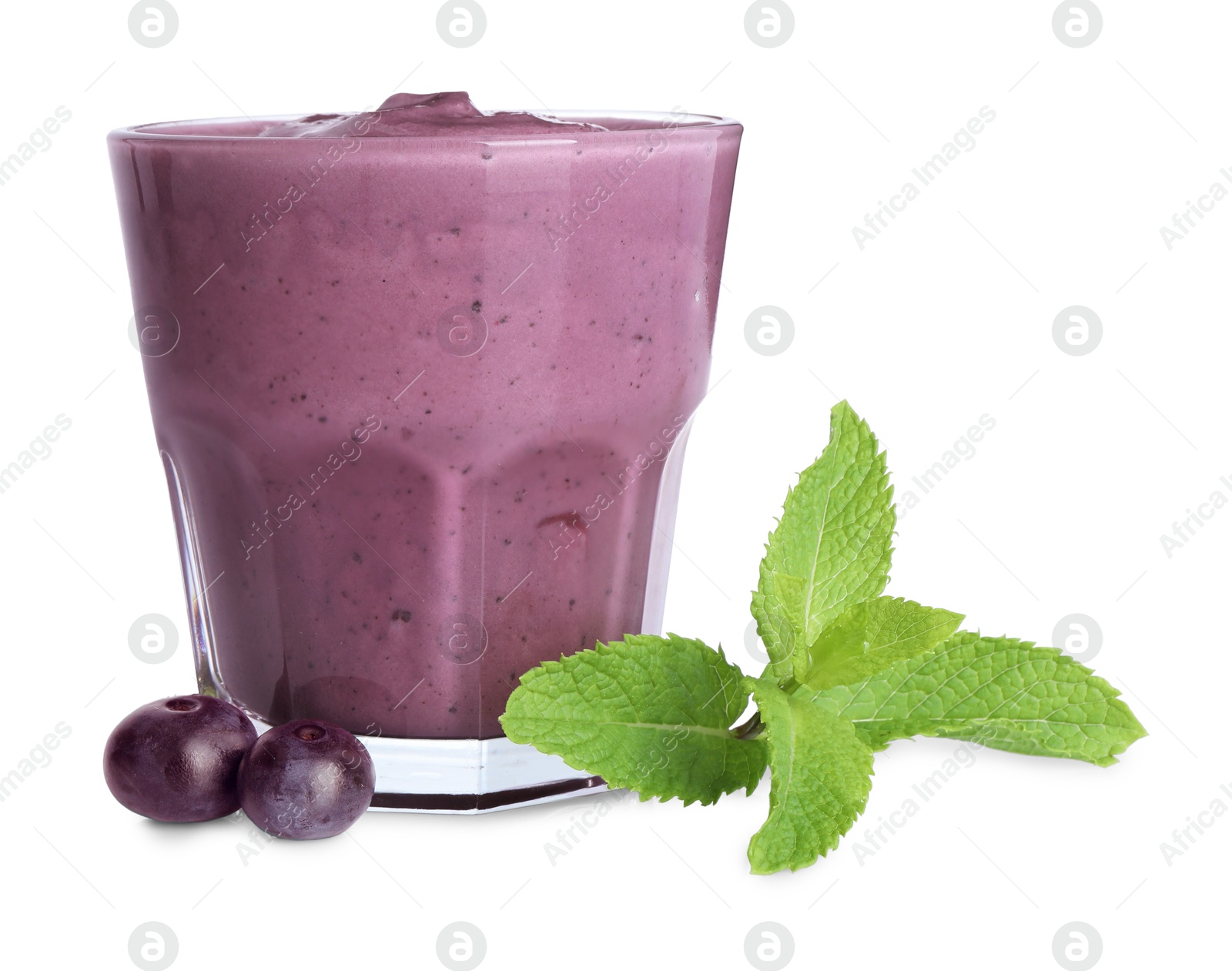 Photo of Tasty acai smoothie in glass, mint and berries isolated on white