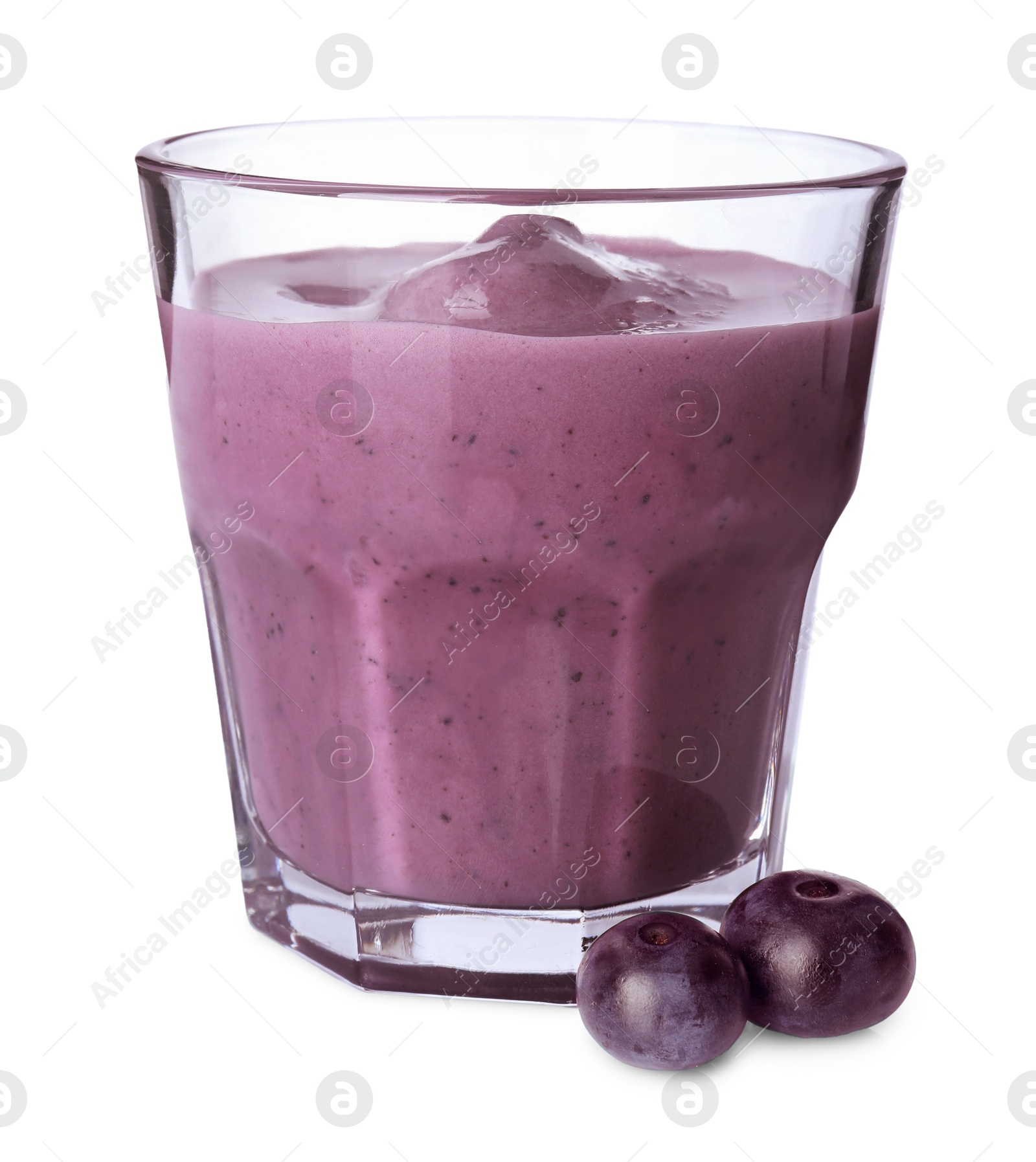 Photo of Tasty acai smoothie in glass and berries isolated on white