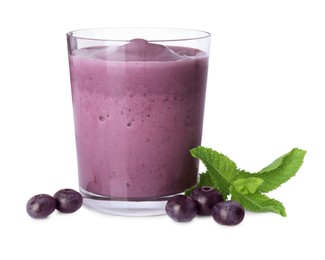 Photo of Tasty acai smoothie in glass, mint and berries isolated on white