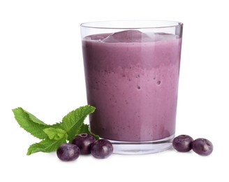 Photo of Tasty acai smoothie in glass, mint and berries isolated on white