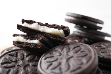 Photo of Tasty sandwich cookies on white background, closeup