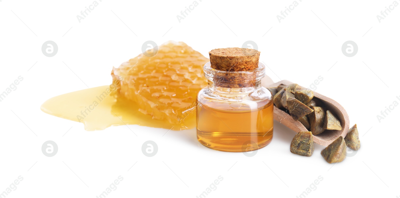 Photo of Natural honey tincture, propolis granules and sweet honeycomb isolated on white