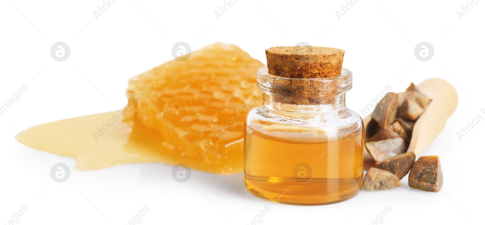 Photo of Natural honey tincture, propolis granules and sweet honeycomb isolated on white