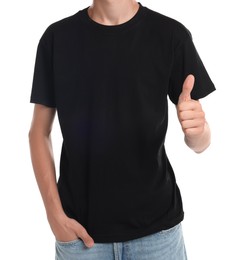 Photo of Teenage boy wearing black t-shirt and showing thumbs up on white background, closeup