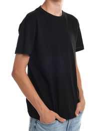 Teenage boy wearing black t-shirt on white background, closeup