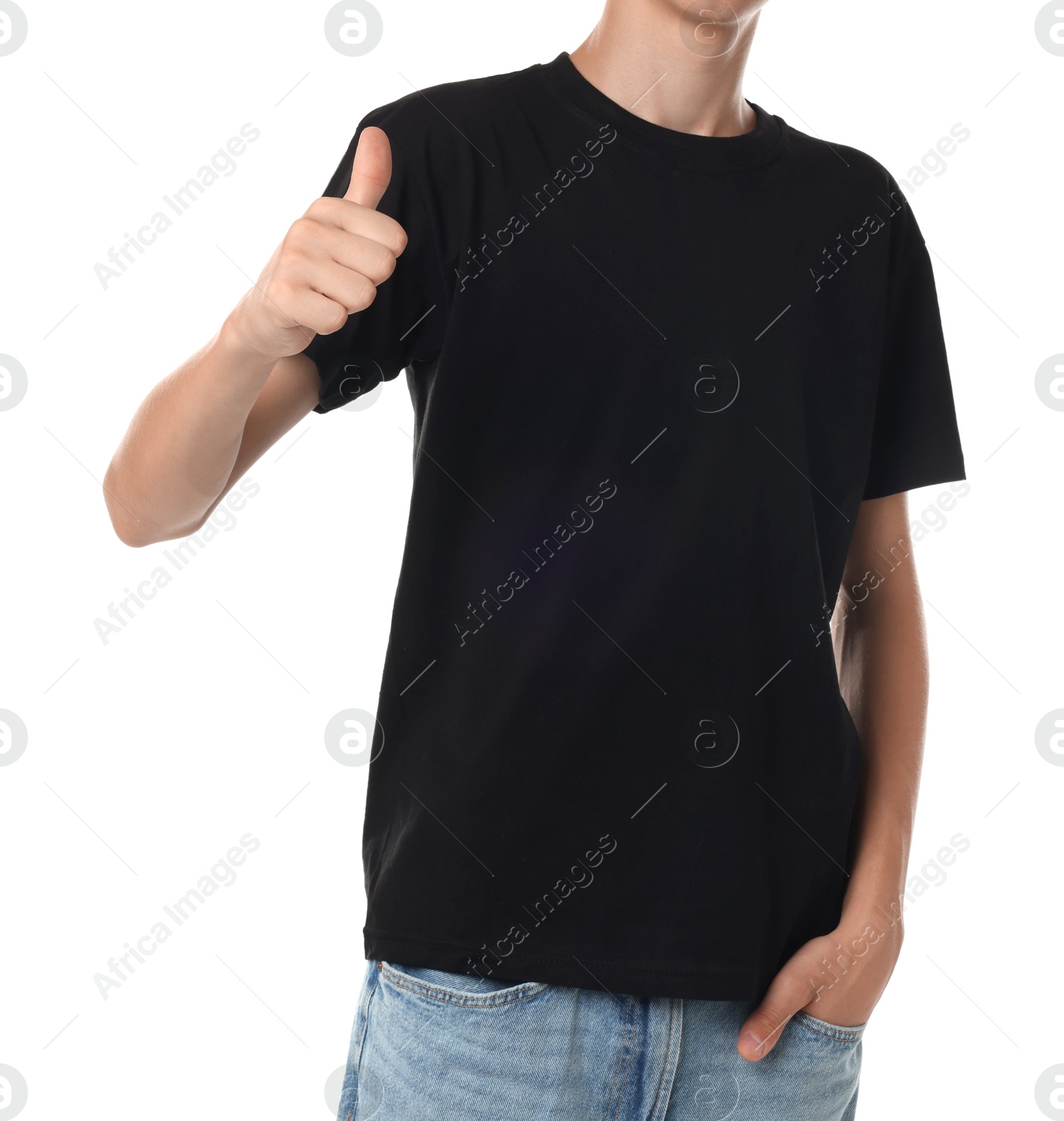 Photo of Teenage boy wearing black t-shirt and showing thumbs up on white background, closeup