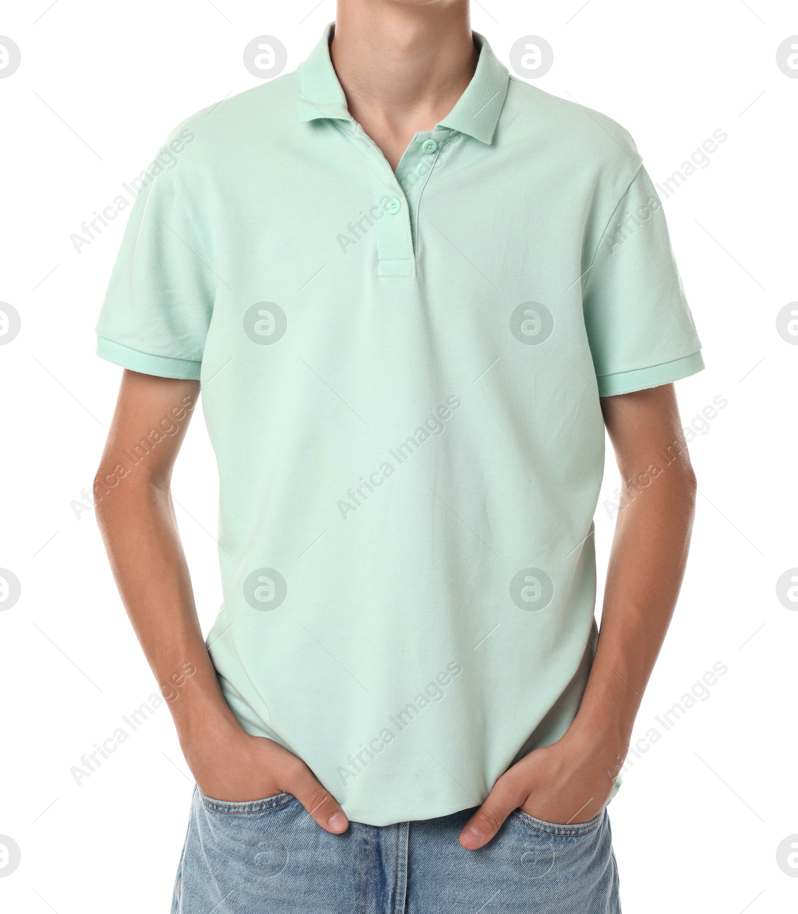 Photo of Teenage boy wearing light green t-shirt on white background, closeup