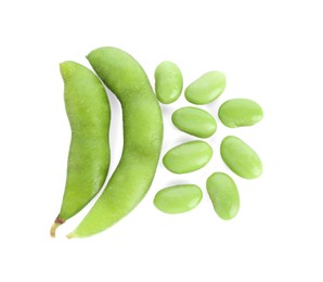 Photo of Raw green edamame soybeans and pods isolated on white, top view