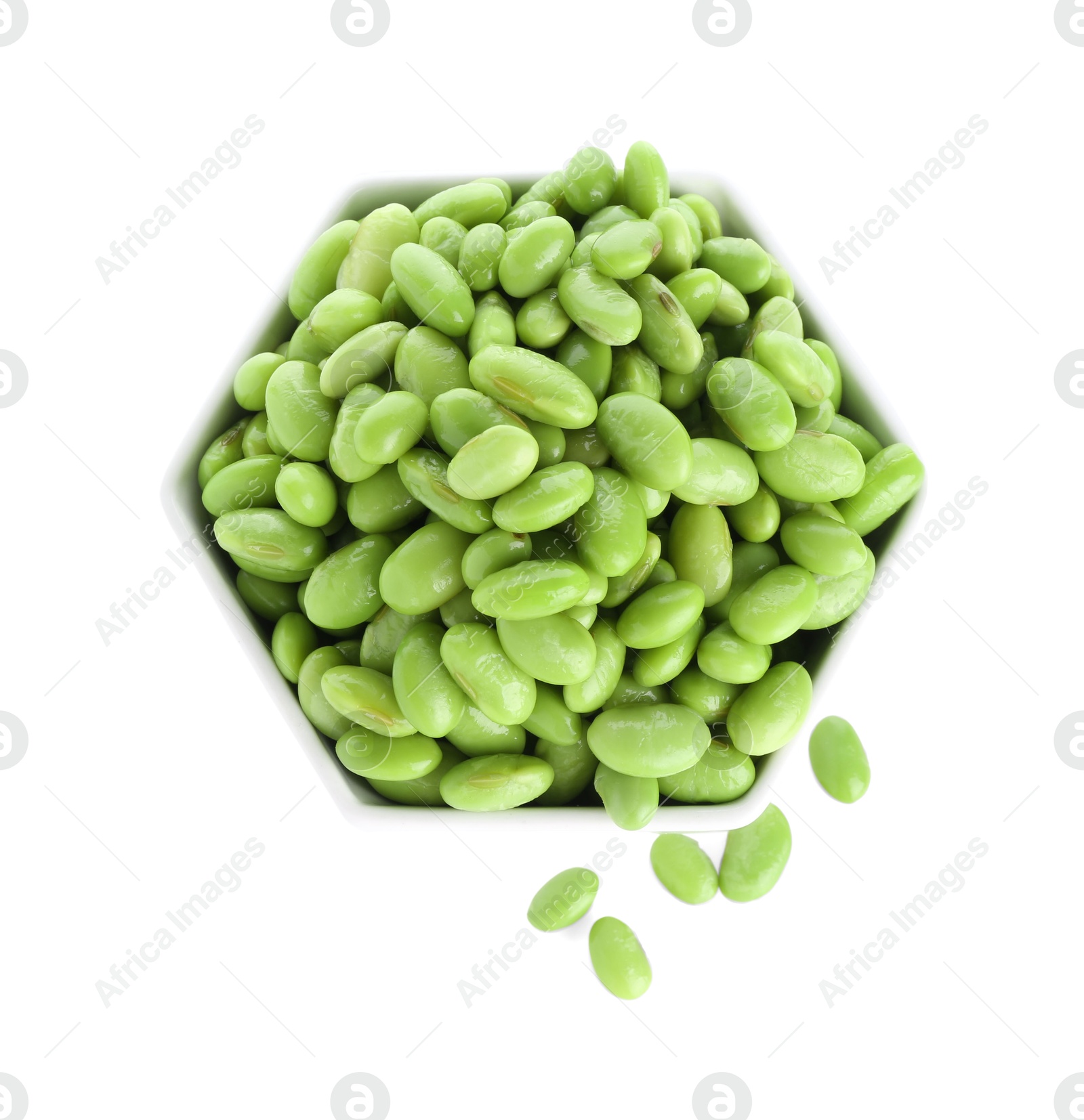 Photo of Raw green edamame soybeans in bowl isolated on white, top view