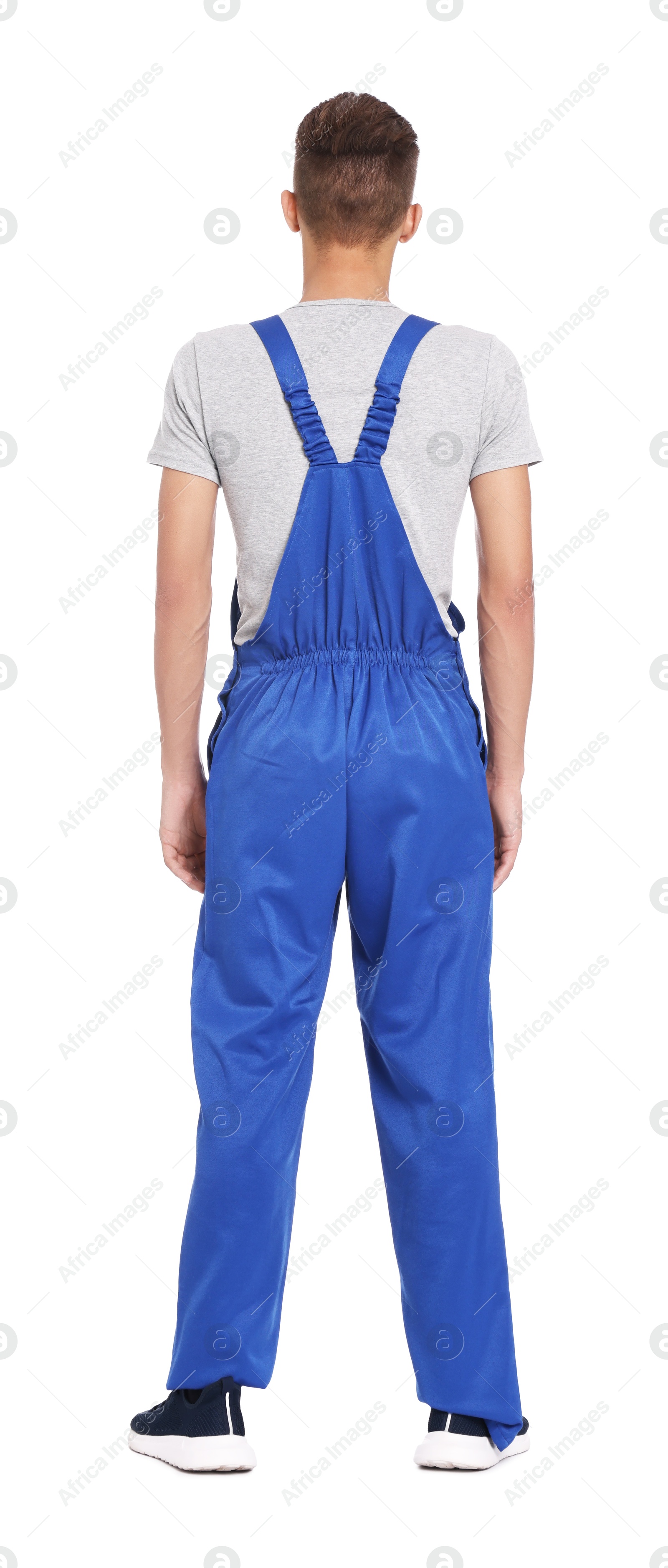 Photo of Auto mechanic in uniform on white background, back view