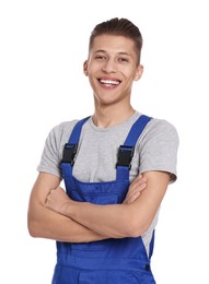 Photo of Smiling auto mechanic with crossed arms on white background