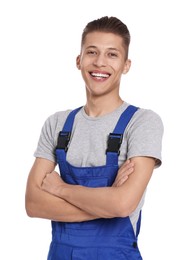 Smiling auto mechanic with crossed arms on white background