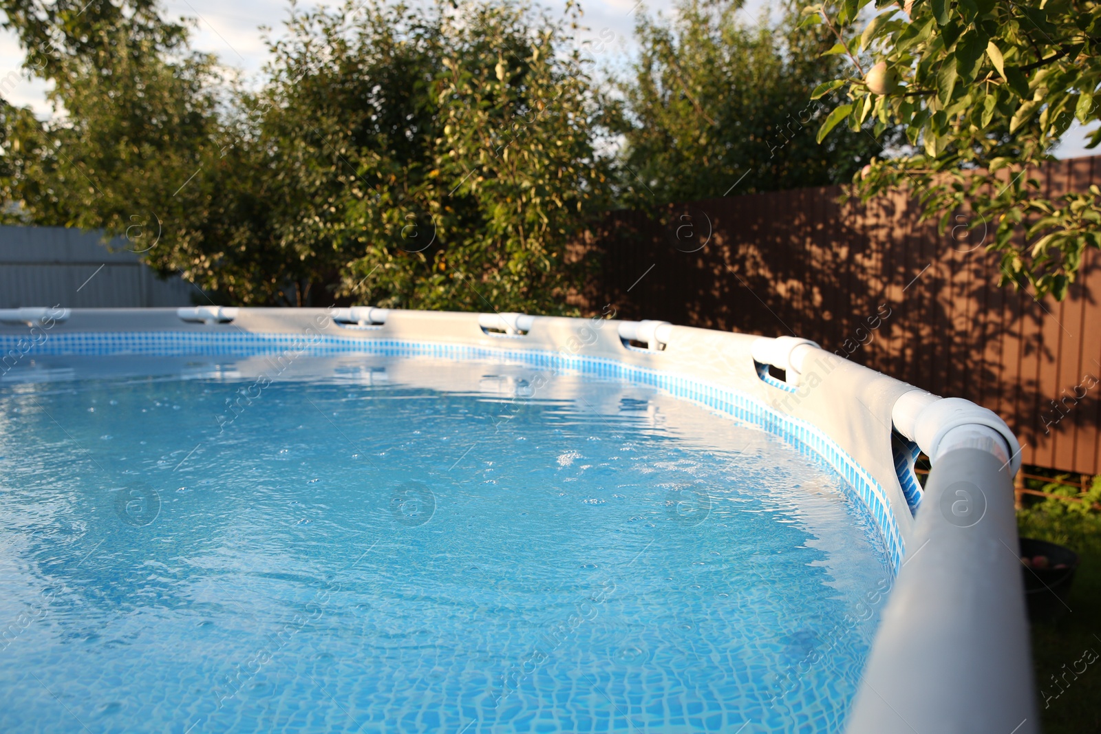 Photo of Above ground swimming pool outdoors on sunny day, closeup