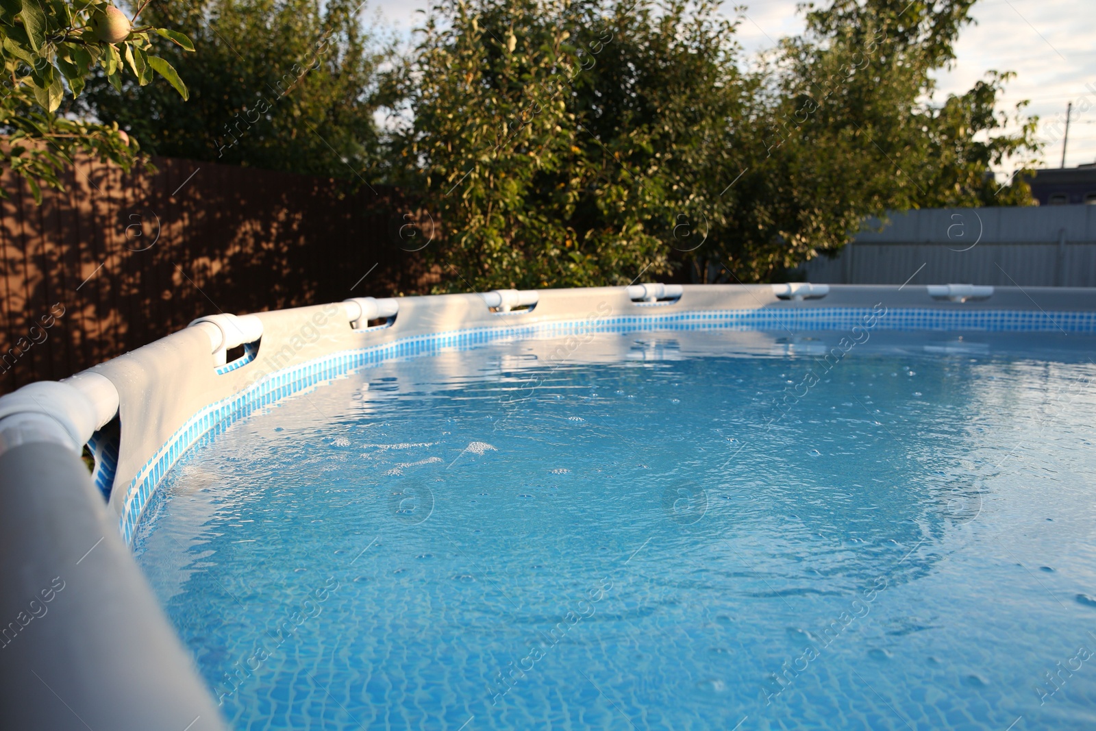 Photo of Above ground swimming pool outdoors on sunny day, closeup