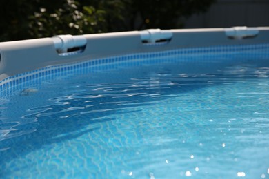 Photo of Above ground swimming pool outdoors on sunny day, closeup