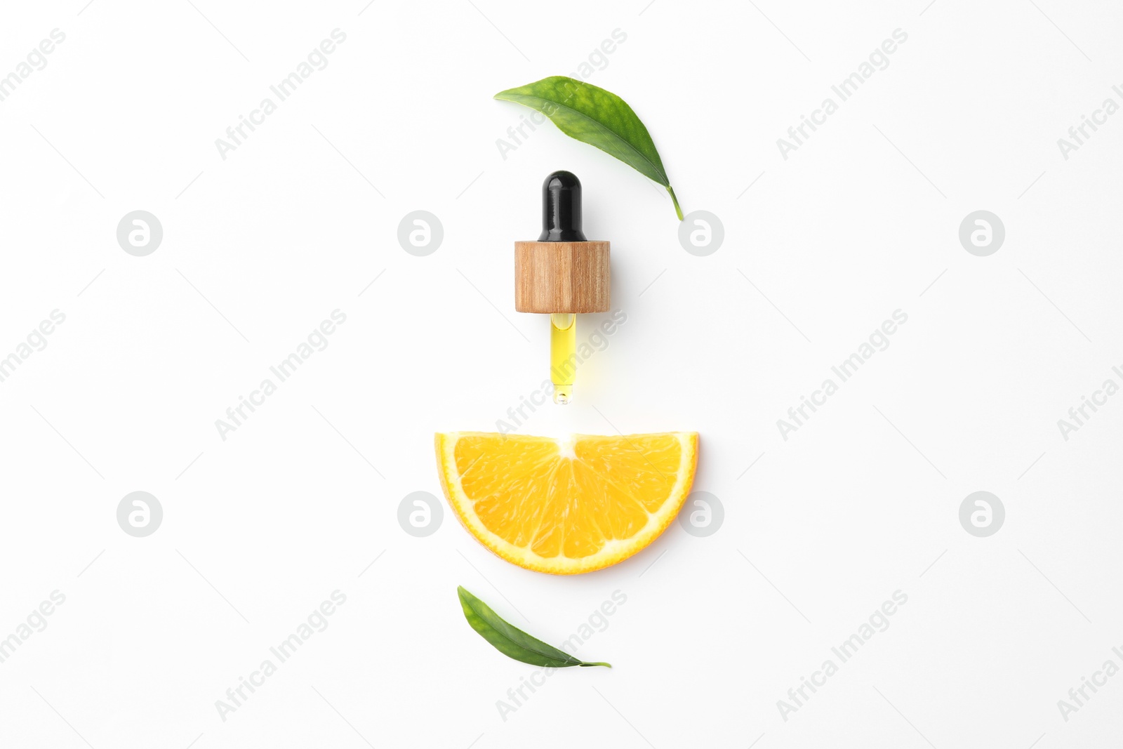 Photo of Dropper of essential oil, orange and green leaves on white background, flat lay