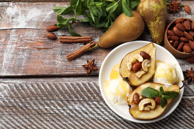 Photo of Delicious baked pears with nuts, ice cream and honey on wooden rustic table, flat lay. Space for text