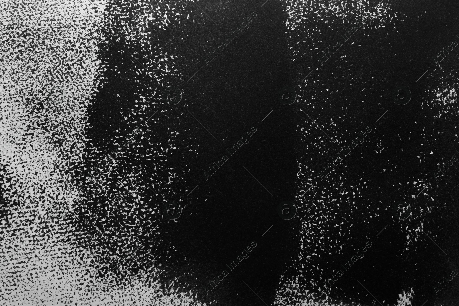 Photo of Texture of paper with black ink as background, top view