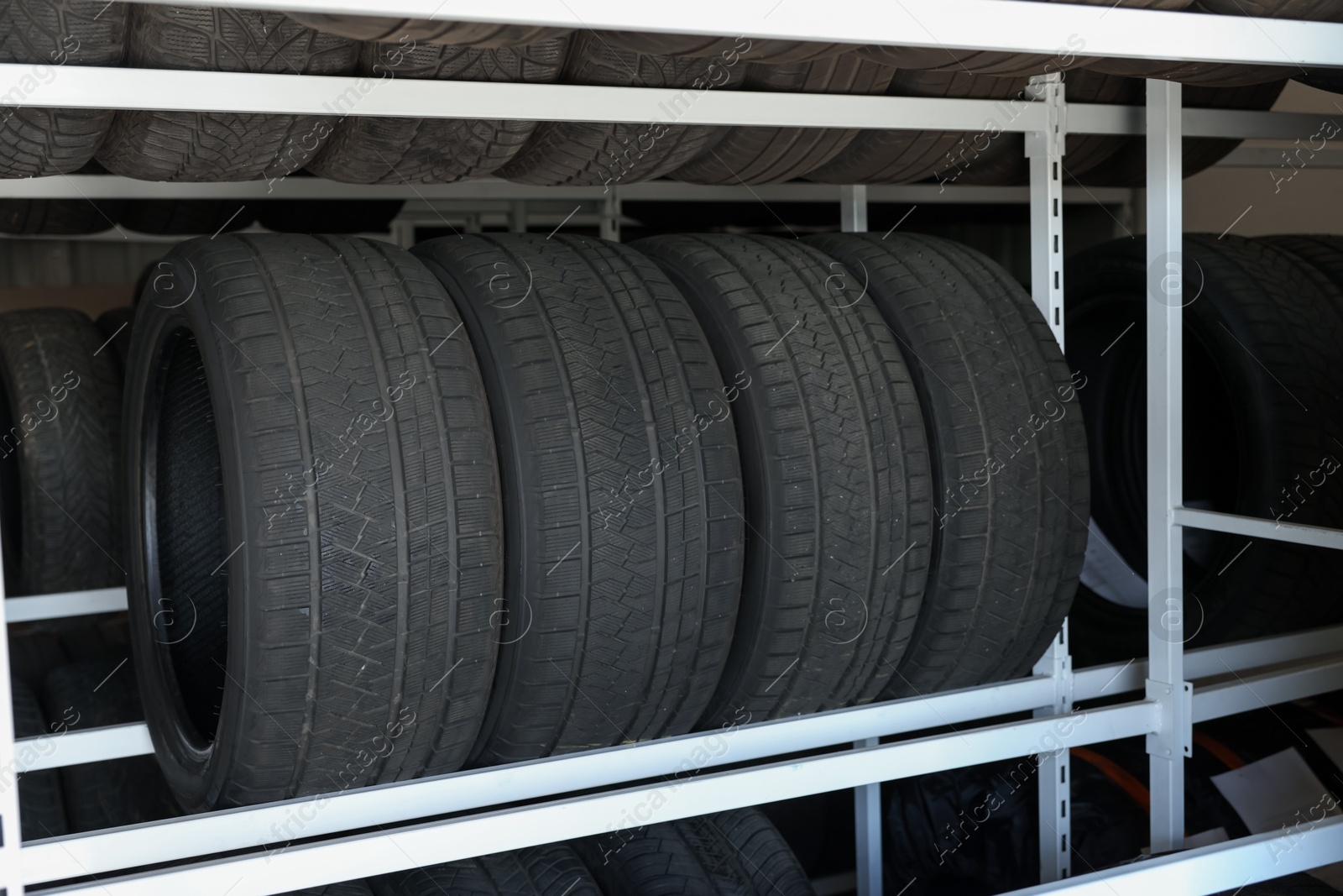 Photo of Group of car tires in auto store