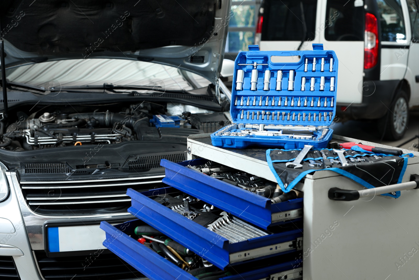 Photo of Set of different auto mechanic's tools indoors