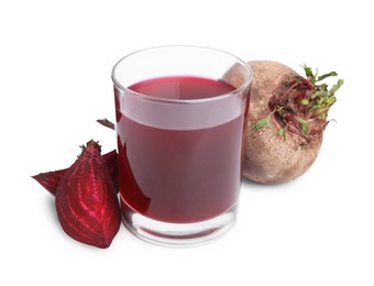 Photo of Fresh beet juice in glass and ripe vegetables isolated on white