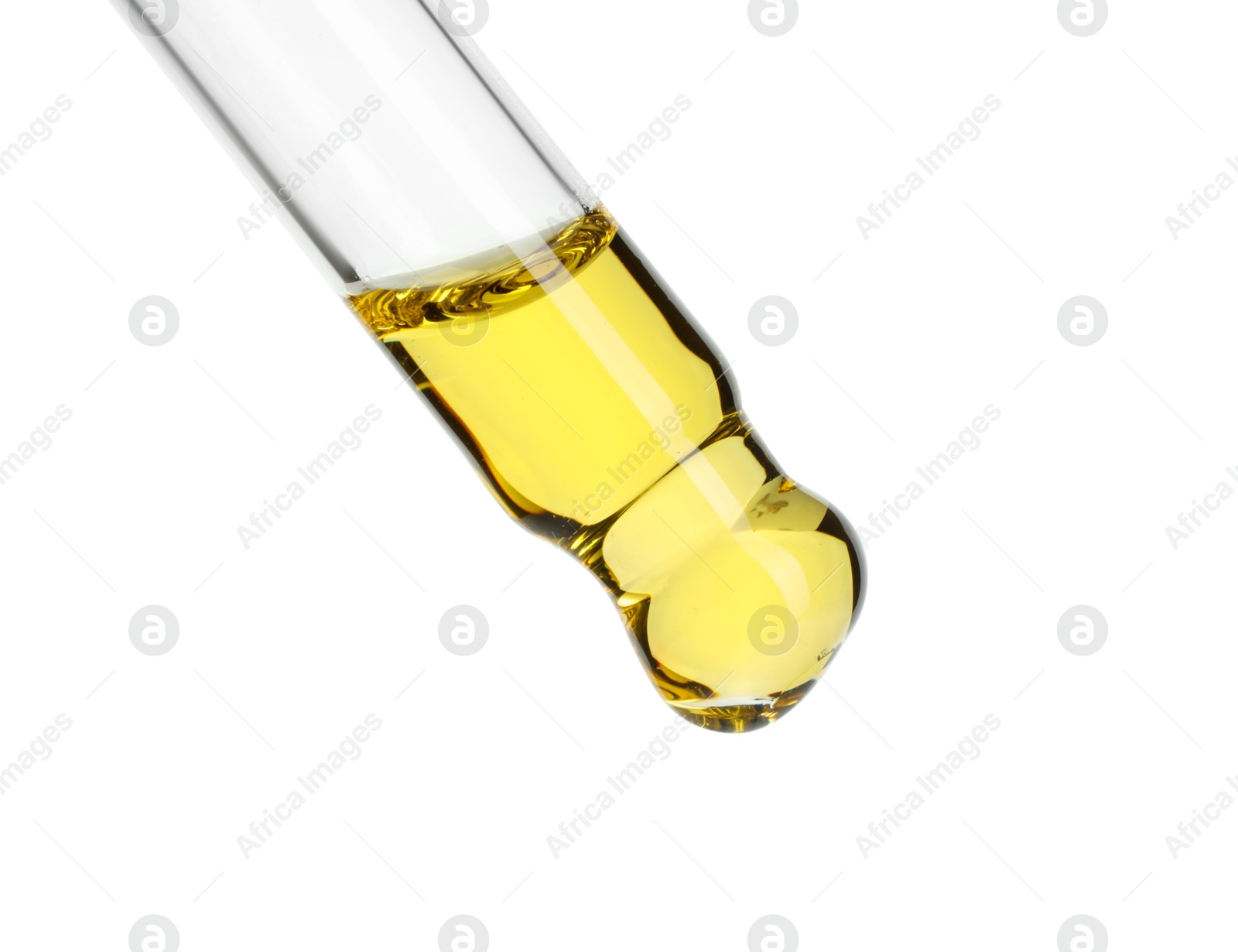 Photo of Dripping essential oil from pipette on white background