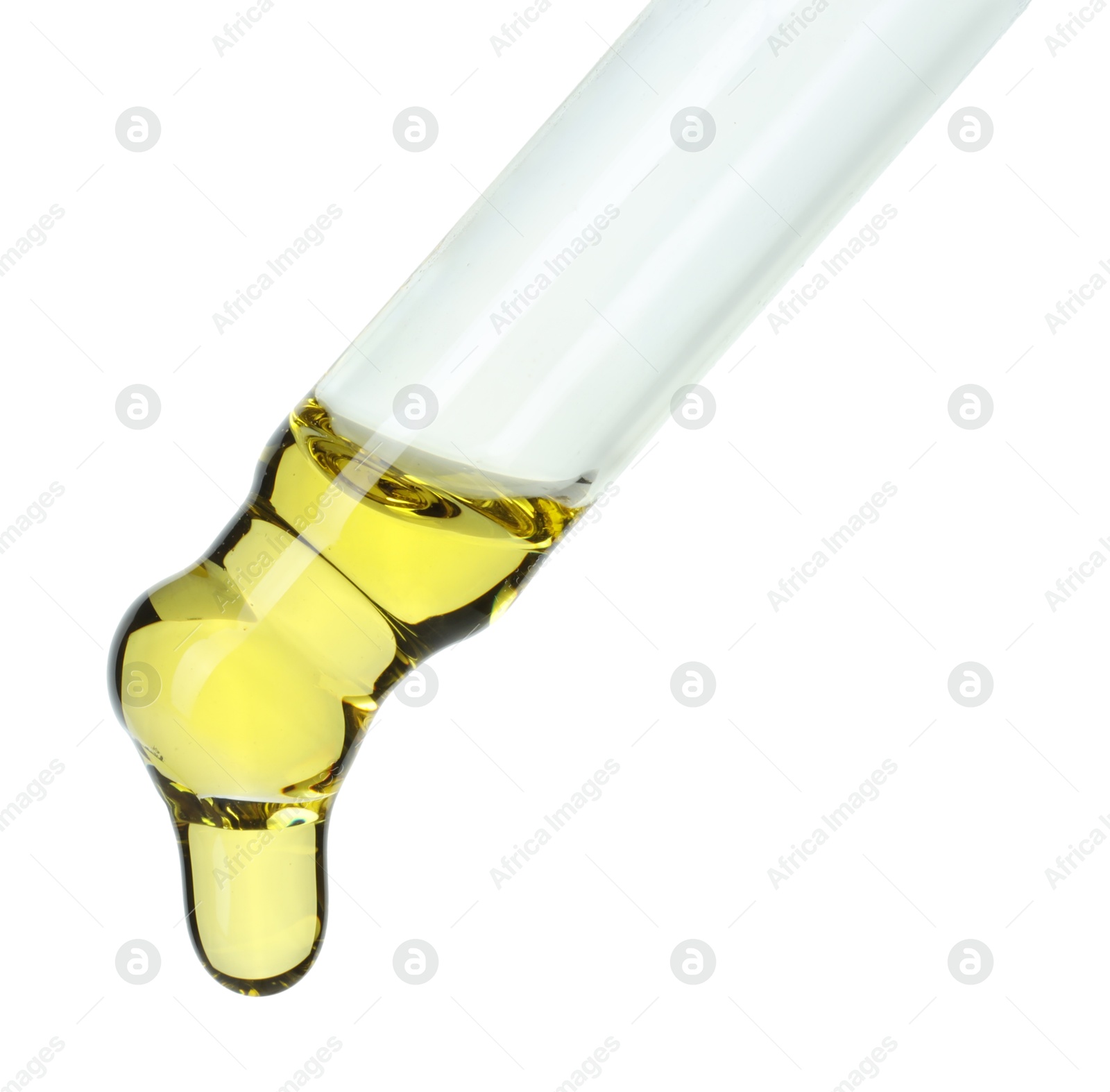 Photo of Dripping essential oil from pipette on white background