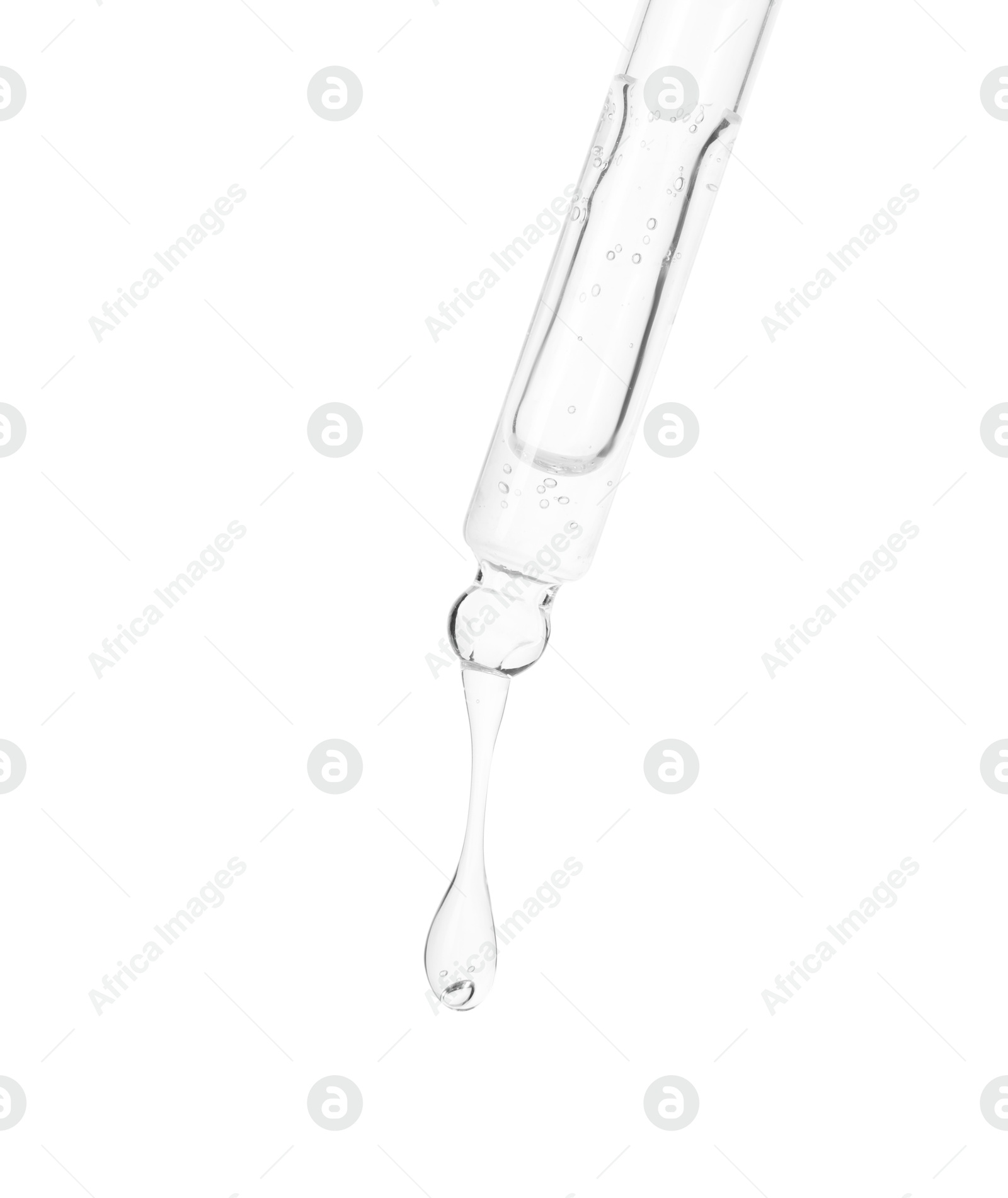 Photo of Dripping cosmetic serum from pipette on white background