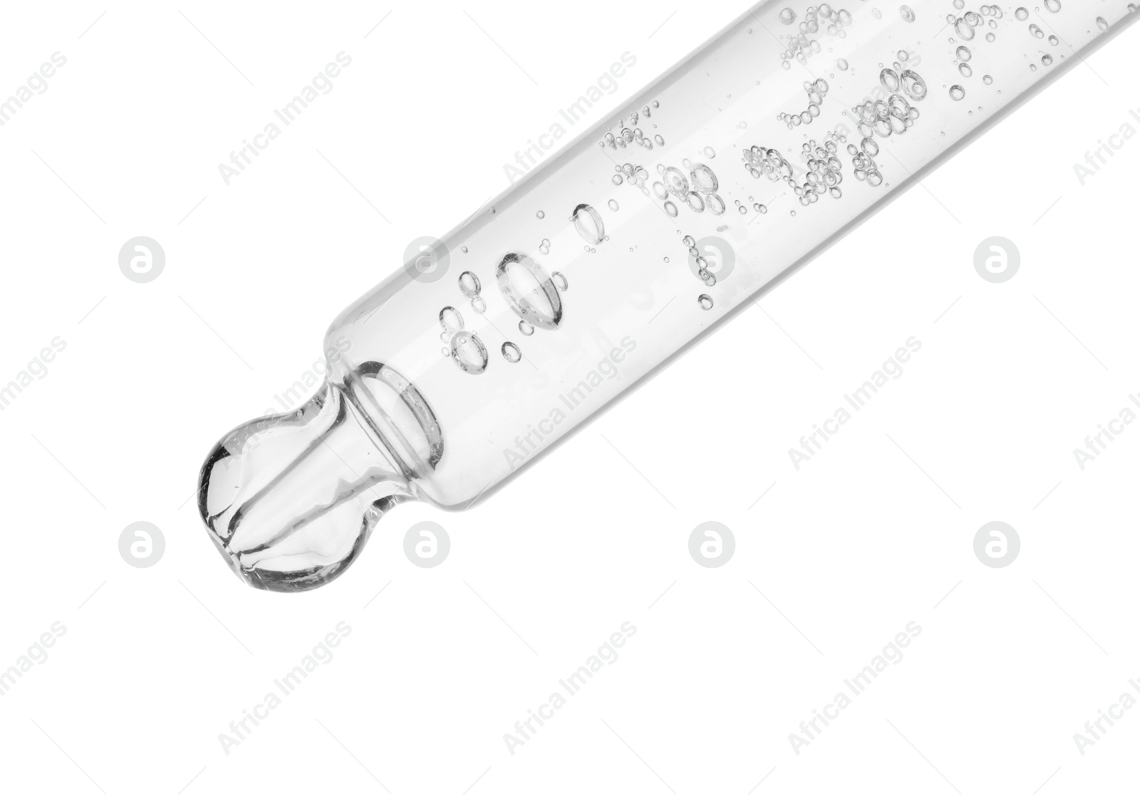 Photo of Dripping cosmetic serum from pipette on white background