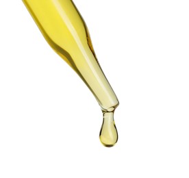 Photo of Dripping essential oil from pipette on white background