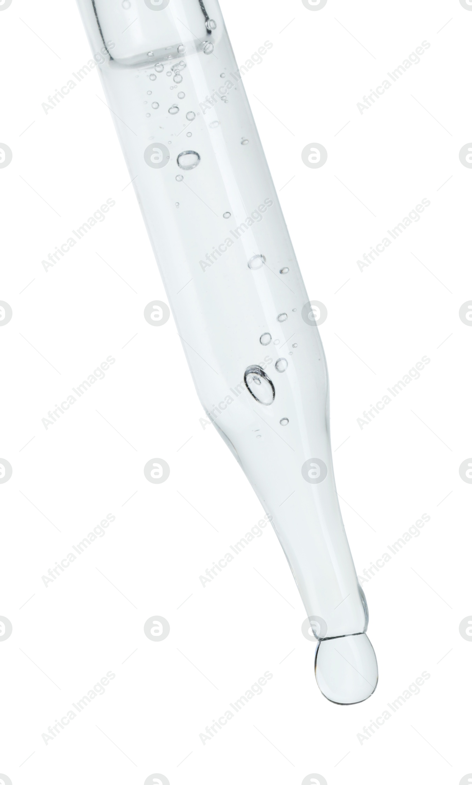 Photo of Dripping cosmetic serum from pipette on white background