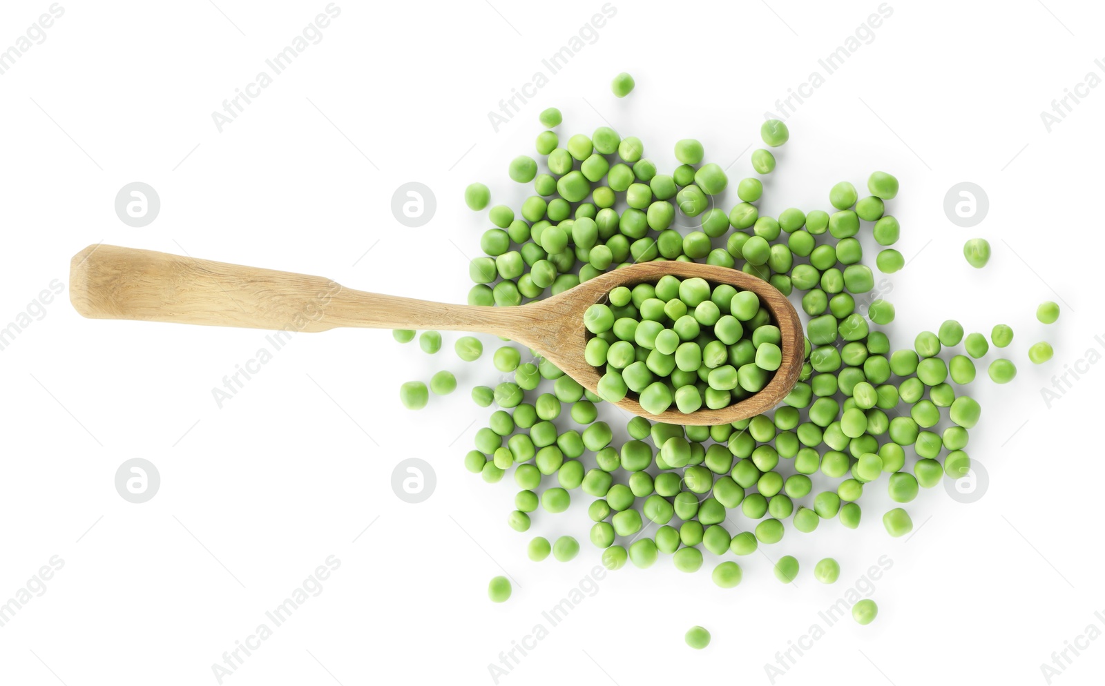 Photo of Fresh green peas in spoon isolated on white, top view