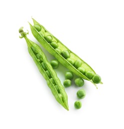 Photo of Green fresh peas and pods isolated on white, top view