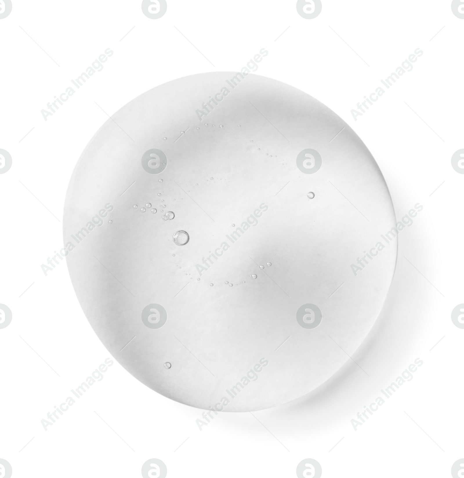 Image of Clear cosmetic oil drop on white background