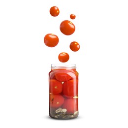 Image of Tomatoes falling into jar on white background