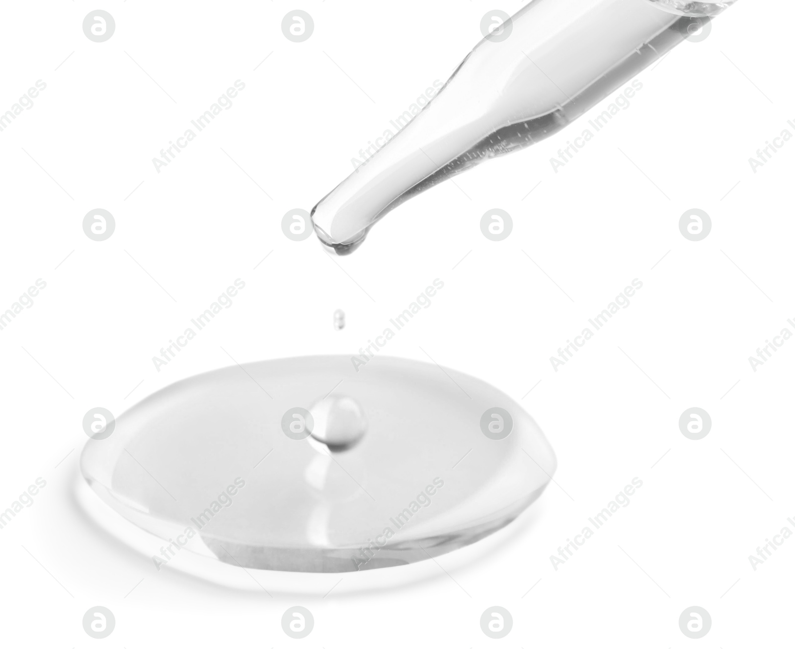 Image of Dropper with clear cosmetic oil on white background