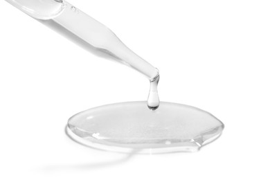 Image of Dropper with clear cosmetic oil on white background