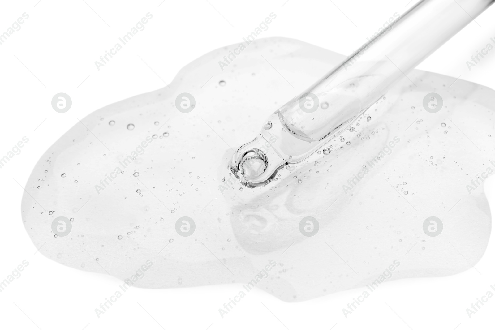 Image of Dropper with clear cosmetic oil on white background