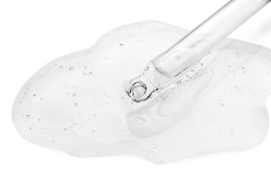 Image of Dropper with clear cosmetic oil on white background